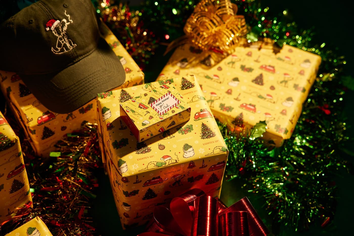 A wrapped gift box beside sports equipment