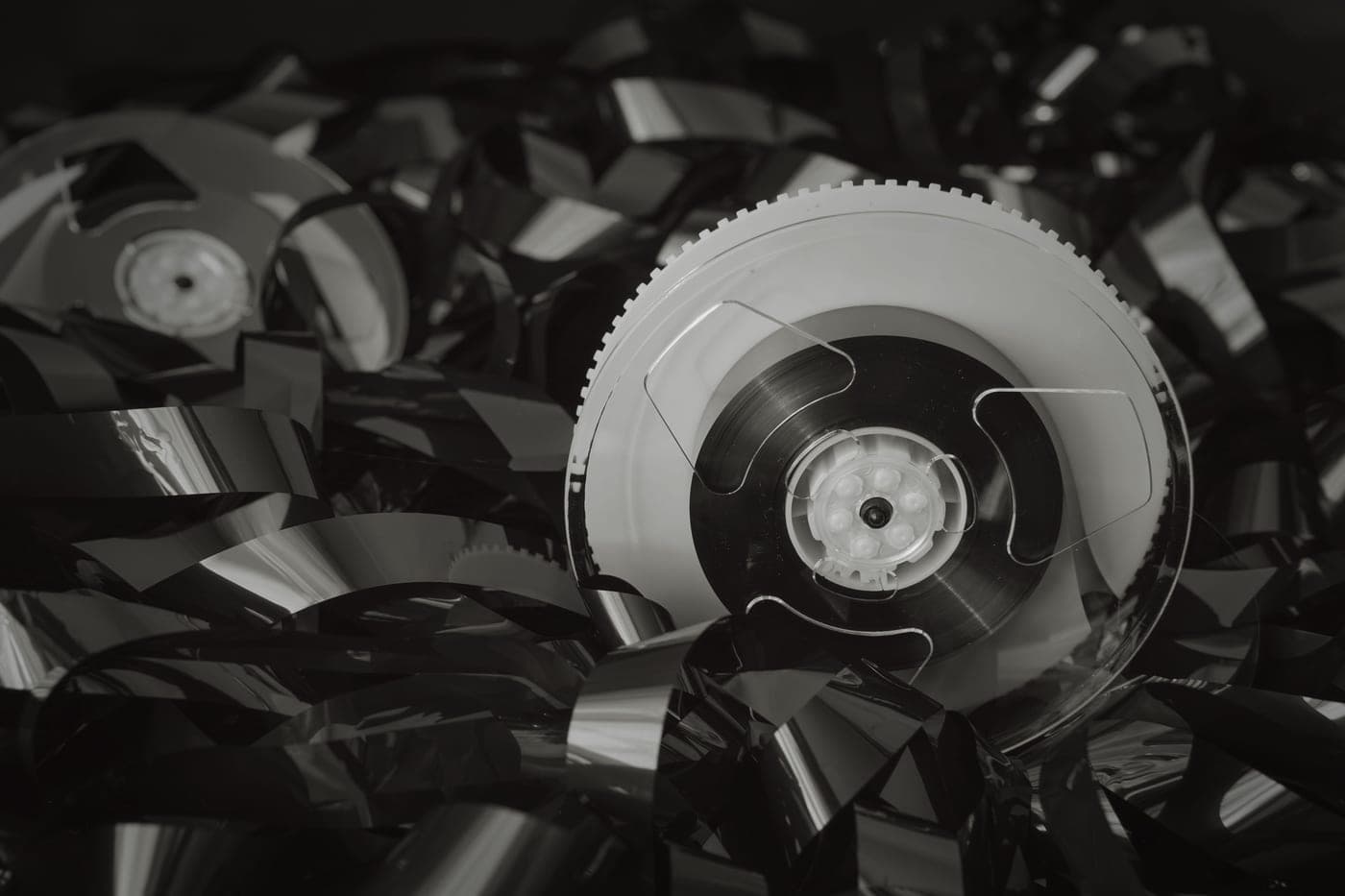 Reels of tennis string on a workshop bench